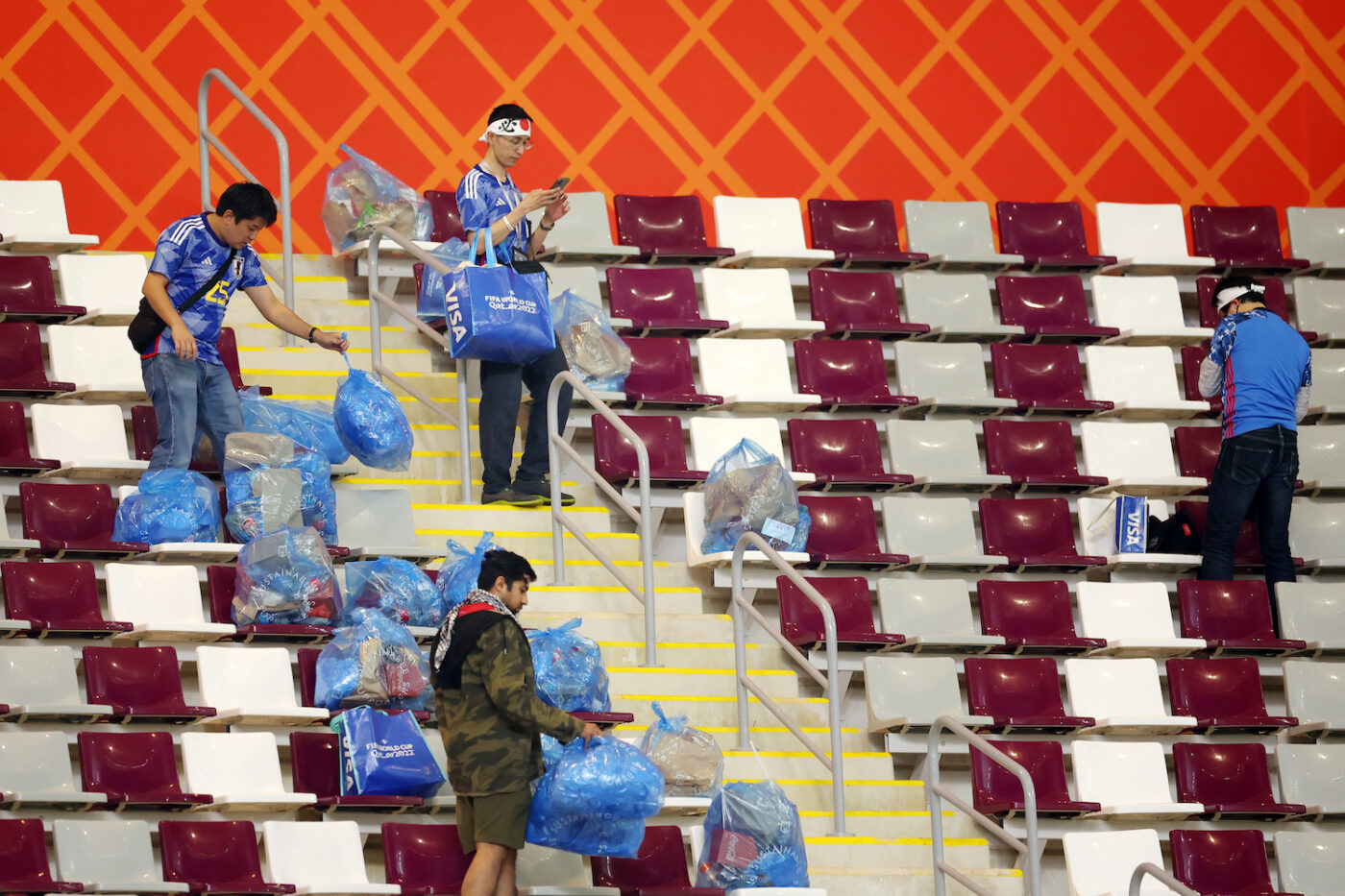 Japan World Cup Fans Stay Behind To Clean Up 'Grubby' German Fans' Mess ...