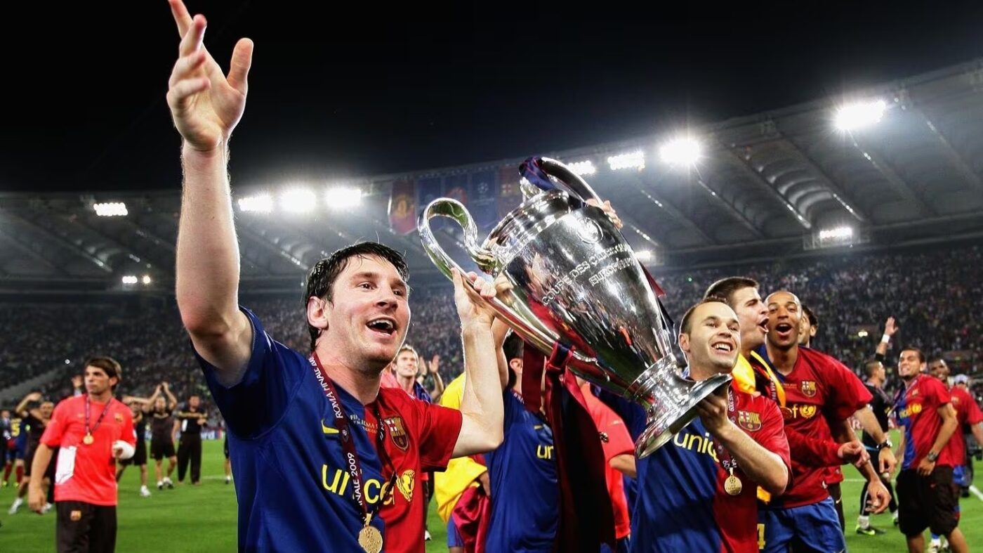 Lionel Messi lifts the UEFA Champions League trophy with Barcelona. 